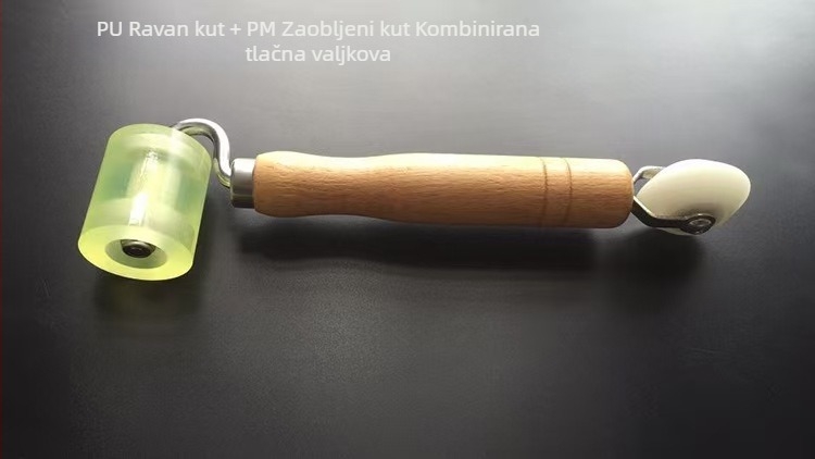 Dvostrani pritiskujući valjak s drškom od bukovine, nylonim valjkom i galvaniziranim nosačem, za postavljanje tapeta