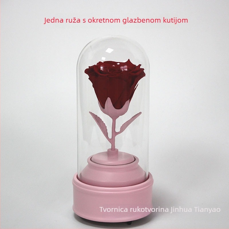 Rotirajuća kristalna kugla s glazbenom kutijom i jednom očuvanom ružom