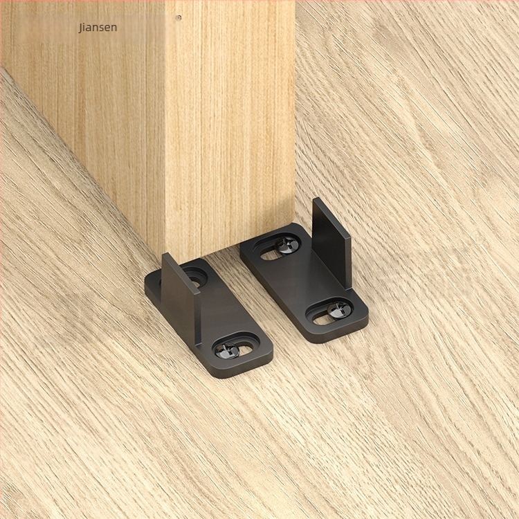 Swing stopper za vrata stila barn door, materijal POM, podno montiranje, ručno upravljanje, marka Johnson