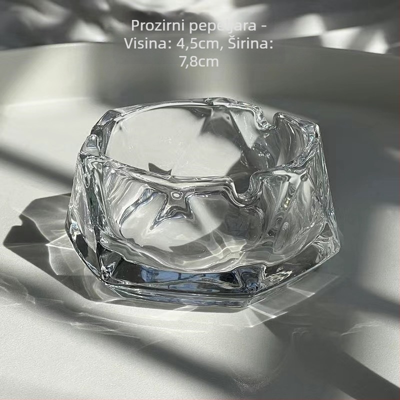 Staklena pepeljara, jednostavnog ali elegantnog stila, s dekorativnim i skladišnim značajkama, pogodna kao dar za dom ili ured.