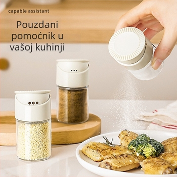 Staklena posuda za začine s dvostrukim otvorima i zatvaračem — sol, kumin i papar