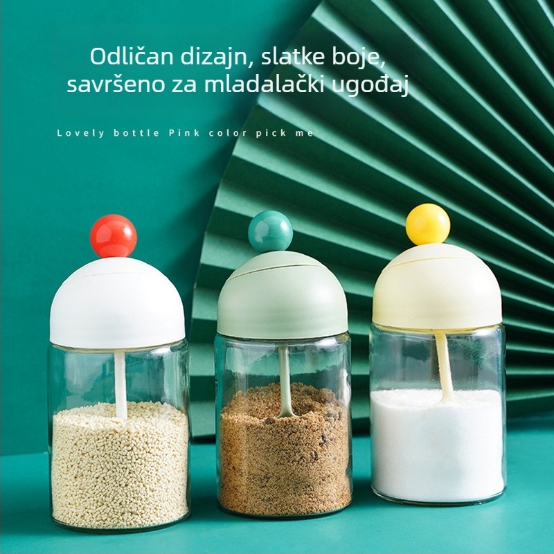 Staklena posuda za začine s integriranim poklopcem i žličicom te otporna na vlagu; dvostruka upotreba za sol i čvrste začine.