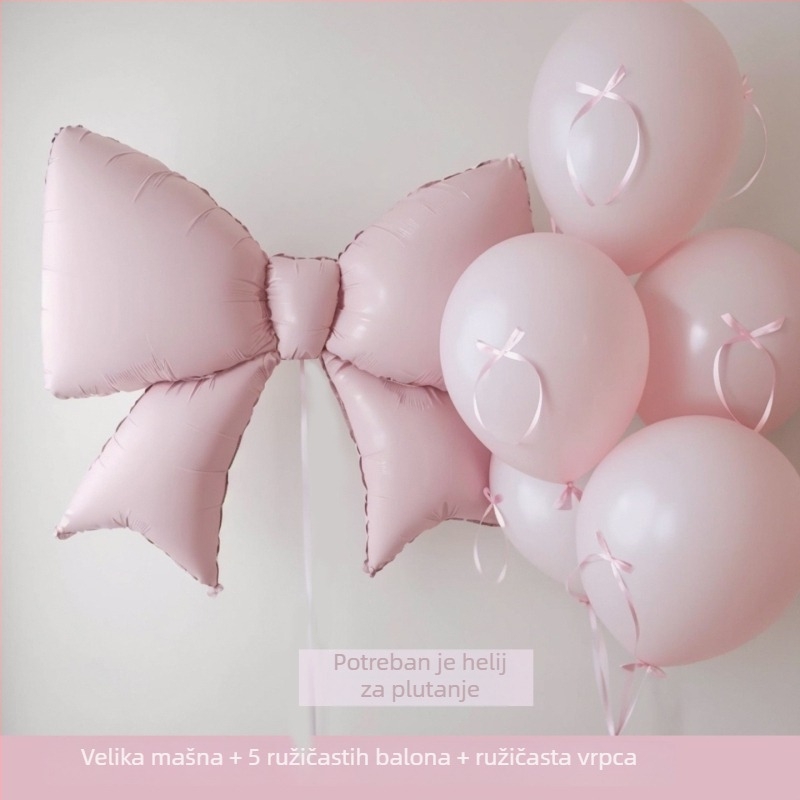 Mat ružičasti balon u obliku mašne i srca od aluminijske folije – dekoracija za fotografiranje na dječjem rođendanu