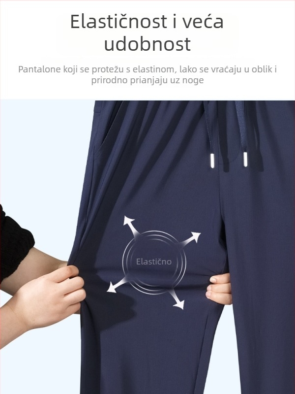 Unisex sportske hlače ravnog kroja, brzo se suše, s visokim elastičnim pojasom; smjesa poliestera visoke elastičnosti.