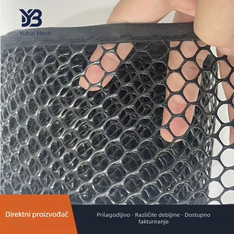 Crna mreža od polietilena za zaštitu bridova između kauča i kreveta; mreža protiv mačaka na donjem rubu koja sprječava padanje predmeta