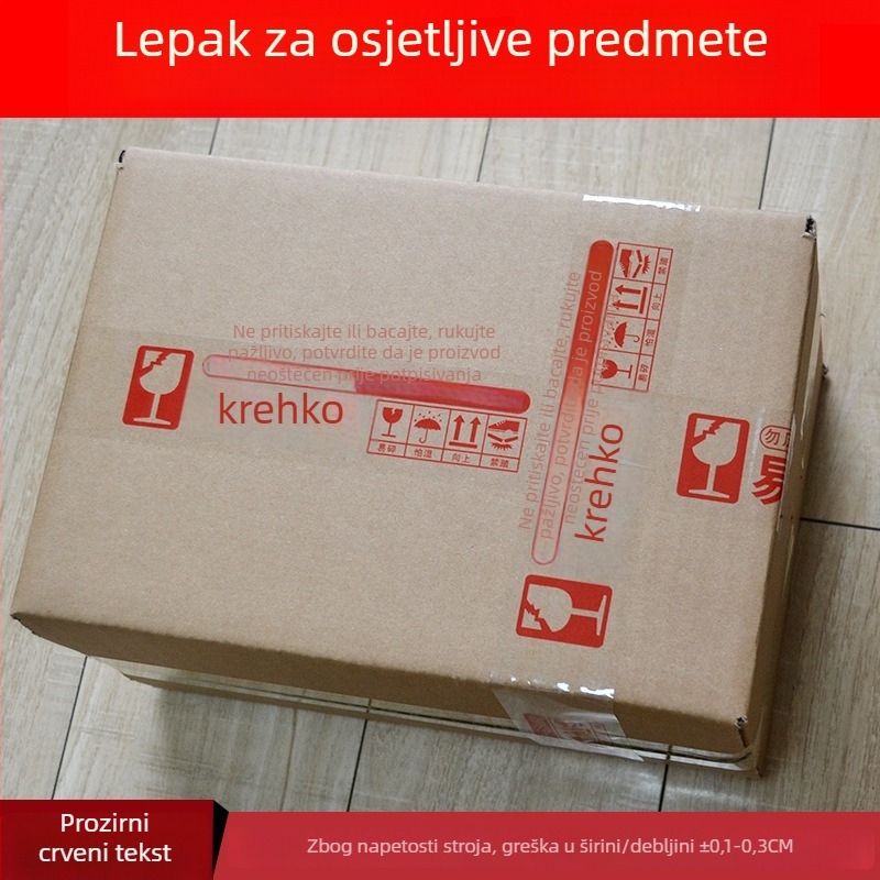 Lenta za pakiranje krhkih artikala uz upozorenje, BOPP film osnove, hidrokloloidno ljepilo, debljina 52 μm, mogućnost rezanja alatom za rezanje, namijenjena zatvaranju i pakiranju