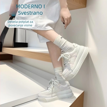 Ženske tenisice s gornjim dijelom teleće kože, debela potplata za povećanje visine, niski vrh, vezanje na vezice, uložak od svinjske kože