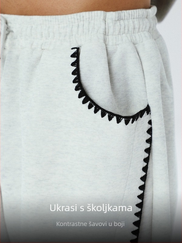 Jesensko izdanje 2025: dekonstrukcijski kroj, shell izšivanje, color-blocking, ravni kroj.
