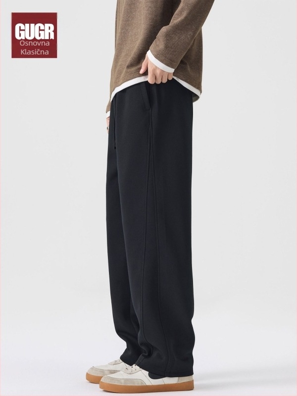 Muške trenirke od pamuk-mešavine, širokog kroja, elastični pojas s vezicom, jednobojne, za jesen