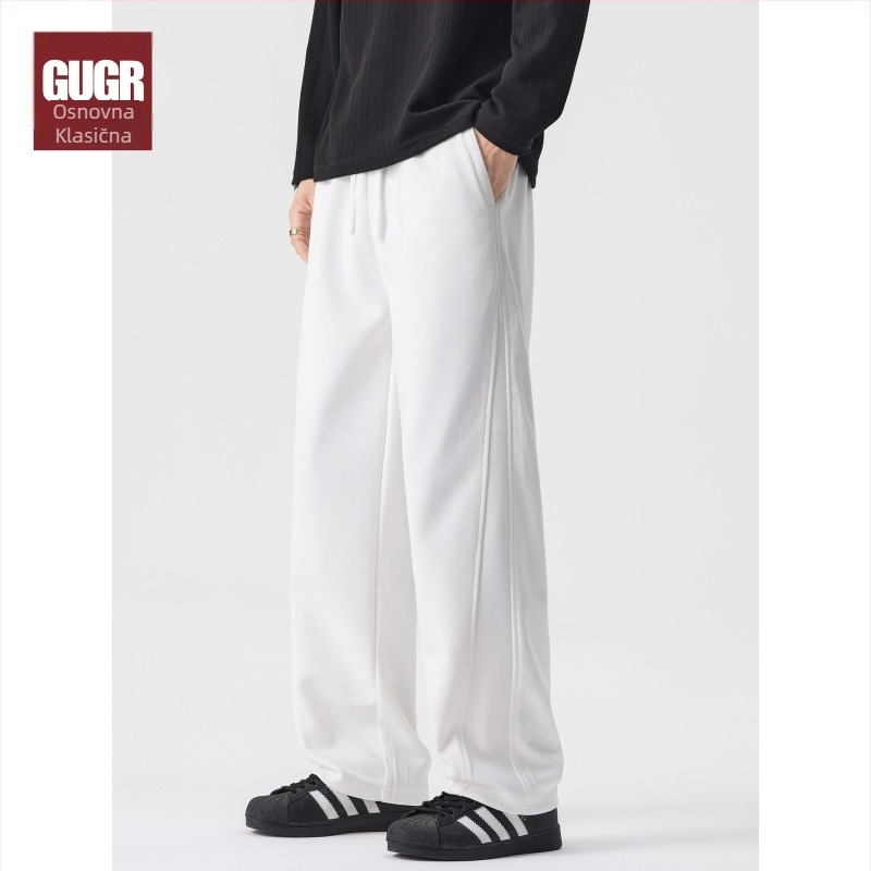 Muške trenirke od pamuk-mešavine, širokog kroja, elastični pojas s vezicom, jednobojne, za jesen