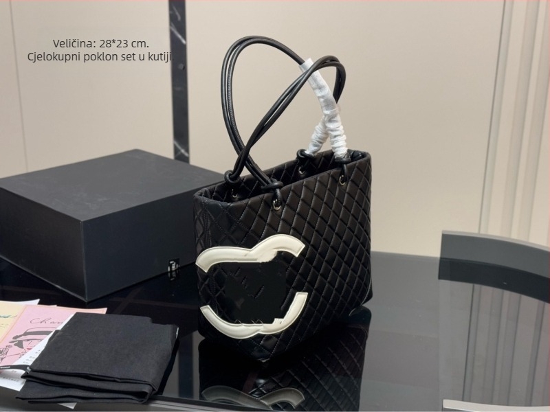 Tote torba – unisex stil – prirodna koža – cilindričnog oblika – zatvarač – Zima 2025