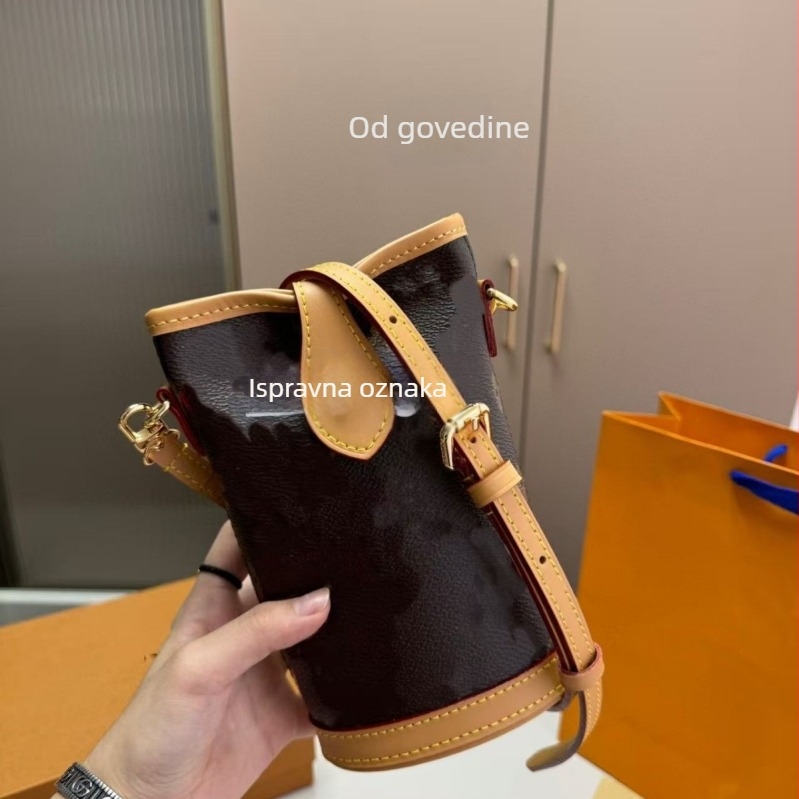 Torba za nošenje preko ramena od prave kože, cilindričnog oblika, džep za telefon, zatvaranje šnurnicom, gradski minimalistički stil