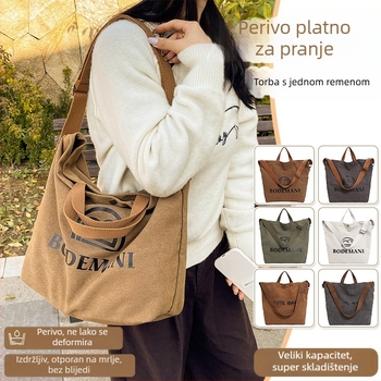 Tote torba u gradsko-stilskom izgledu, platno materijal, horizontalni kvadratni oblik, uspravan otvor s unutarnjim zatvaračem