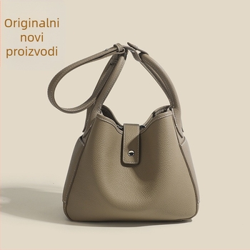 Ženska torba od prave kože, bucket stil, magnetsko zatvaranje, poliesterska podstava, dvostruki naramenice
