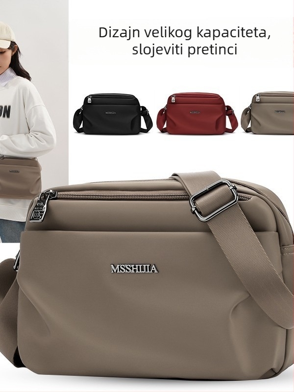 Ženska crossbody torba, tekstilni materijal, urban minimalistički stil, horizontalni kvadratni oblik, zatvarač, džep za telefon
