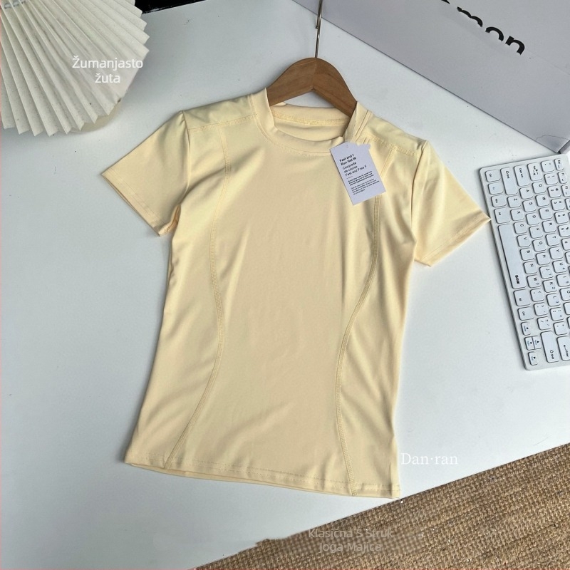 Majica kratkih rukava, okrugli izrez, uski kroj, jednobojni uzorak; poliester-spandeks mješavina