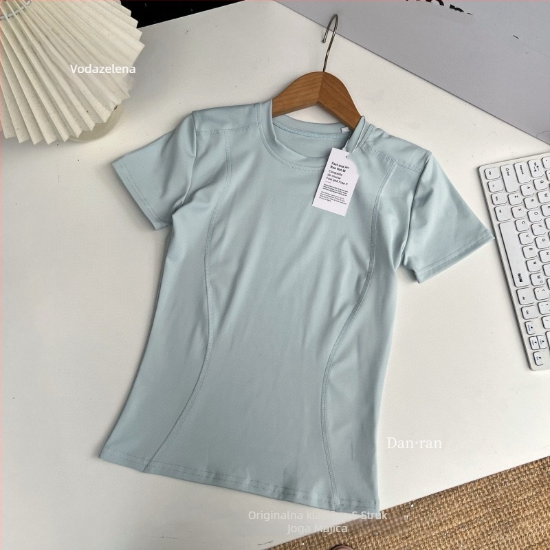 Majica kratkih rukava, okrugli izrez, uski kroj, jednobojni uzorak; poliester-spandeks mješavina