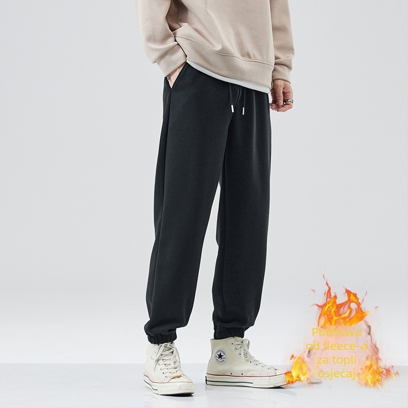 Muške sportske hlače s flis podstavom, debele, s vezicom za podešavanje, široki kroj, 63% pamuk / 37% poliester