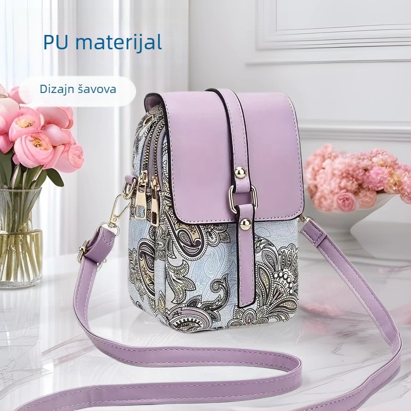 Crossbody torba od PU kože, vertikalnog kvadratnog oblika s poklopcem; zatvaranje poklopcem; unutarnji pretinci: džep sa zatvaračem, džep za mobitel, ID džep, laminirani džep; podstava od poliestera; jedan naramenica; brend Easy