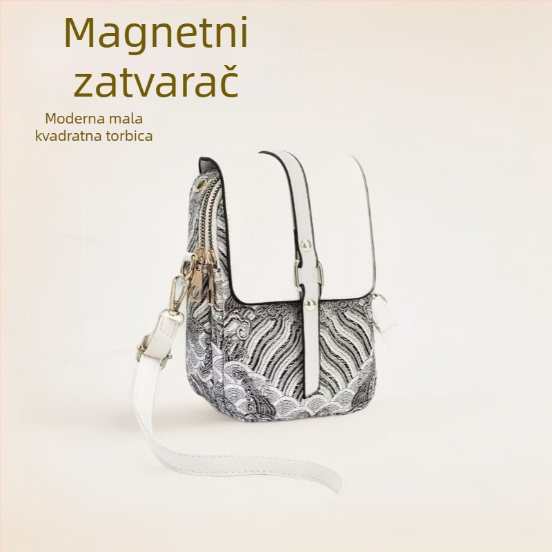 Crossbody torba od PU kože, vertikalnog kvadratnog oblika s poklopcem; zatvaranje poklopcem; unutarnji pretinci: džep sa zatvaračem, džep za mobitel, ID džep, laminirani džep; podstava od poliestera; jedan naramenica; brend Easy