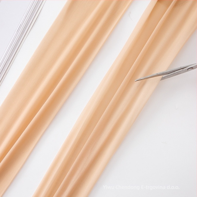 Najlon čarape iznad koljena s podizanjem bokova i oblikovanjem, jednobojne, tanke, sadržaj najlona 70–80%