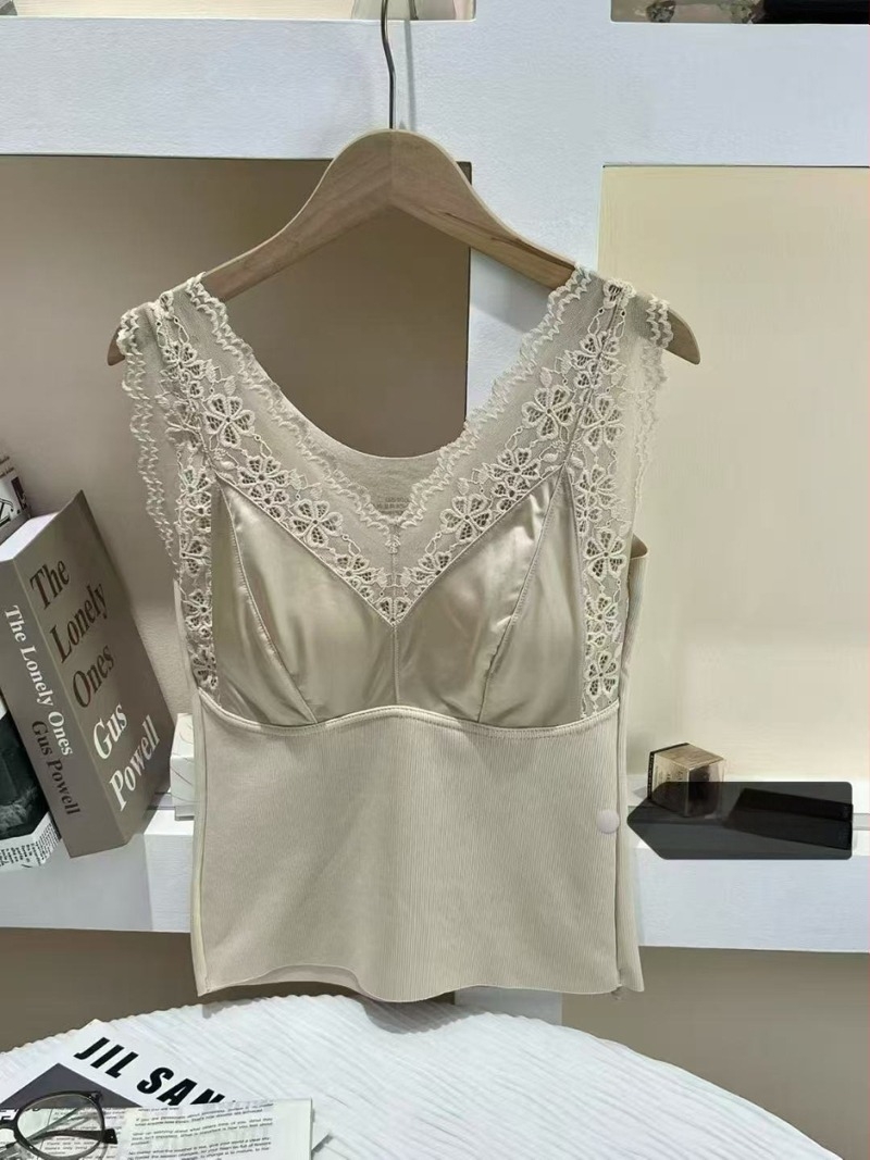 Termalno gornji dio s V izrezom, debeli viskozni materijal 70–80%, 201–250 g/m²; može se nositi kao baza ili vanjska odjeća; uzorak jednobojan ili cvjetni; jednoslojno