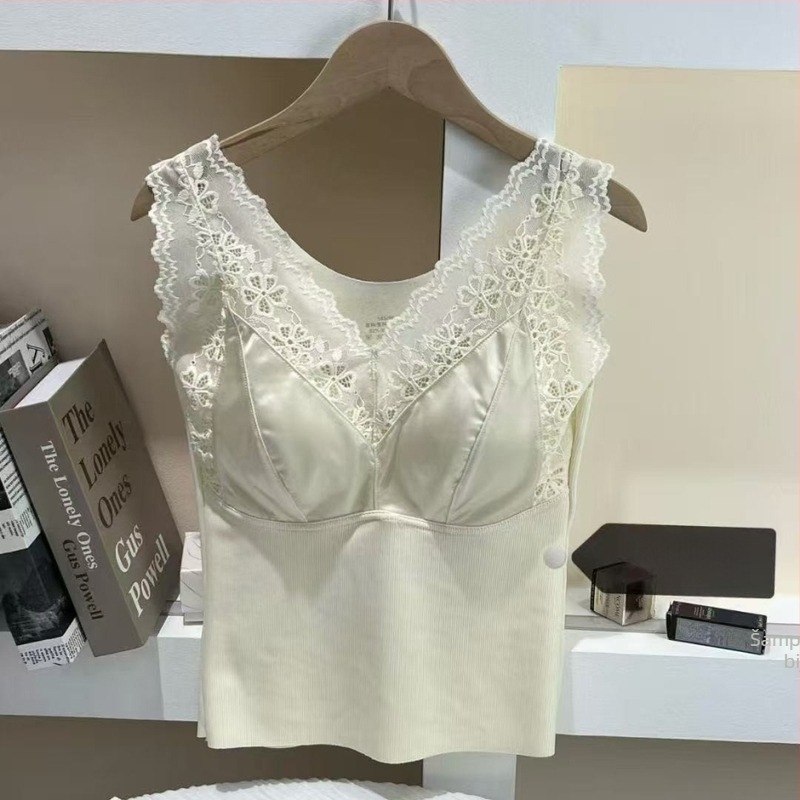 Termalno gornji dio s V izrezom, debeli viskozni materijal 70–80%, 201–250 g/m²; može se nositi kao baza ili vanjska odjeća; uzorak jednobojan ili cvjetni; jednoslojno