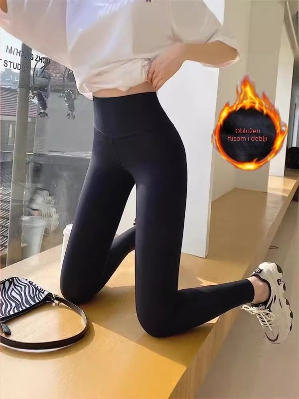 Joga hlače s flis podstavom, visokim pojasom za kontrolu trbuha, brzo se suše, uski kroj, skraćena duljina, mješavina najlona i spandexa (70-80% najlona, <30% spandexa)
