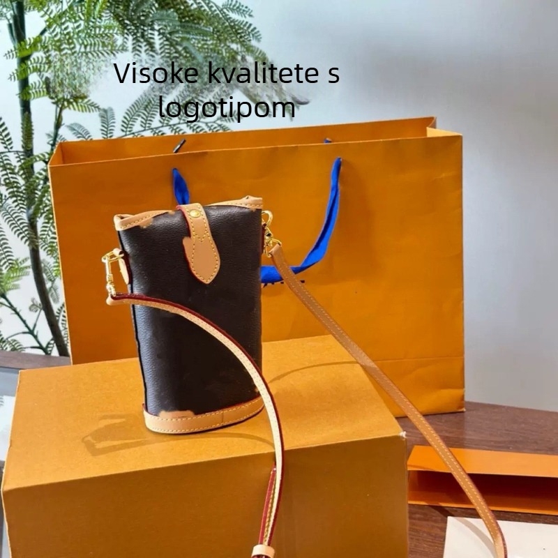 Bucket torba cilindričnog oblika od prave kože, gradski jednostavan stil, otvaranje šnira i kopčom, unutarnja džep za telefon i laminirani džep sa zatvaračem