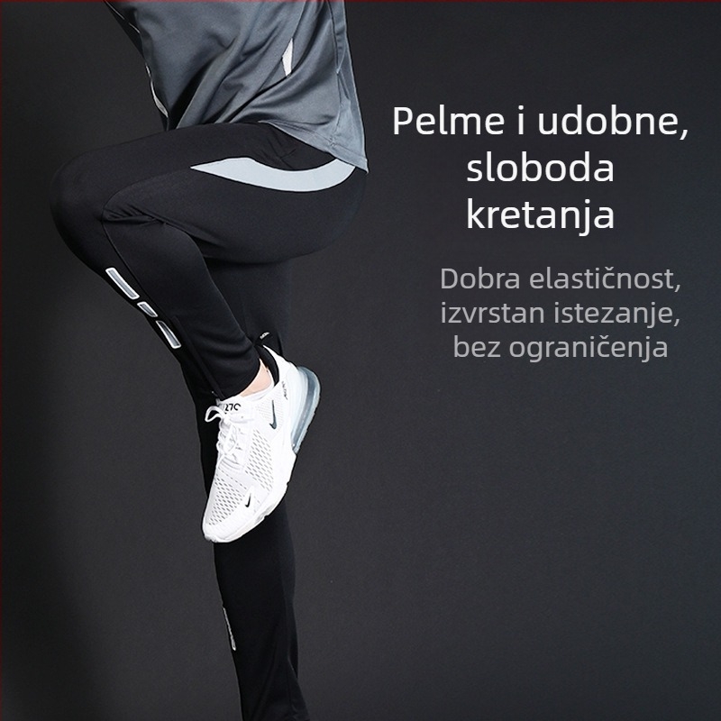 Muške sportske hlače sa srednjom visinom struka, uskog kroja, brzo sušeće i vlage odvode, bočna traka, poliester 98% mješavina.