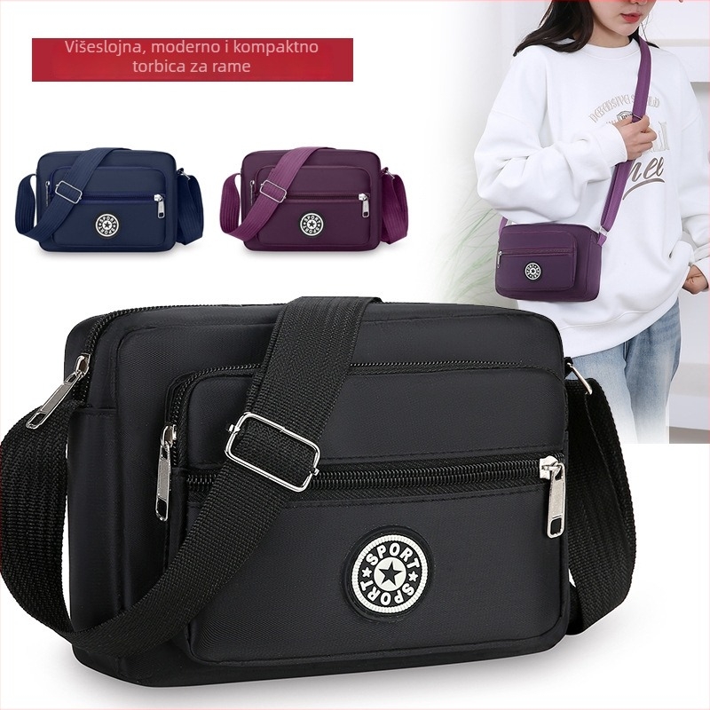 Crossbody torba od Oxford platna, kompaktna kvadratna forma, sa zatvaračem i pretincima za telefon i dokumente