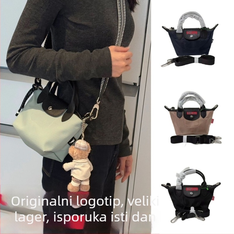 Unisex torba od prave kože u obliku dumplinga sa flap zatvaračem, velika kapaciteta; unutarnji džepovi za telefon, dokumente, laptop i kameru