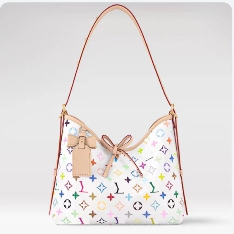 Carryall bucket torba u suradnji s Murakami Takashi; PVC materijal; platnena podstava; horizontalno kvadratni oblik; otvaranje zatvaračem; laminirani unutarnji džep