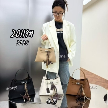 Bucket Bag – gradska minimalistička crossbody torba, PU materijal, zatvarač na kopču, skriveni džep sa zatvaračem, vodoravni pravokutni oblik, proljetno izdanje 2026