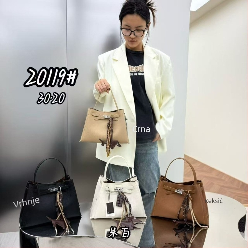 Bucket Bag – gradska minimalistička crossbody torba, PU materijal, zatvarač na kopču, skriveni džep sa zatvaračem, vodoravni pravokutni oblik, proljetno izdanje 2026