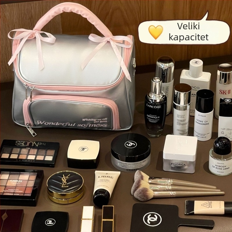 Šmink torbica s mašnicom, PU materijal, vodootporna, zatvarač na zip, kontrastni uzorak
