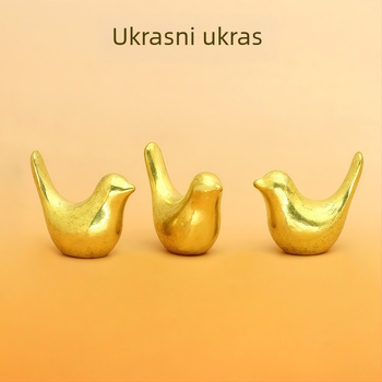 Zlatni bakreni ukras u obliku ptice za dom