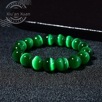 Ženski narukvica s jednim krugom od zelenih staklenih perli s mačjim okom