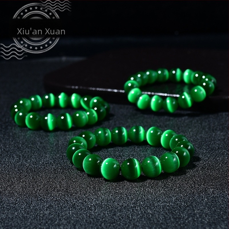 Ženski narukvica s jednim krugom od zelenih staklenih perli s mačjim okom