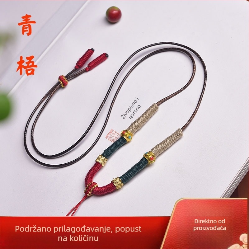 Ručno tkana Thangka ogrlica s crvenom užicom i privjeskom od jadeita i jantara