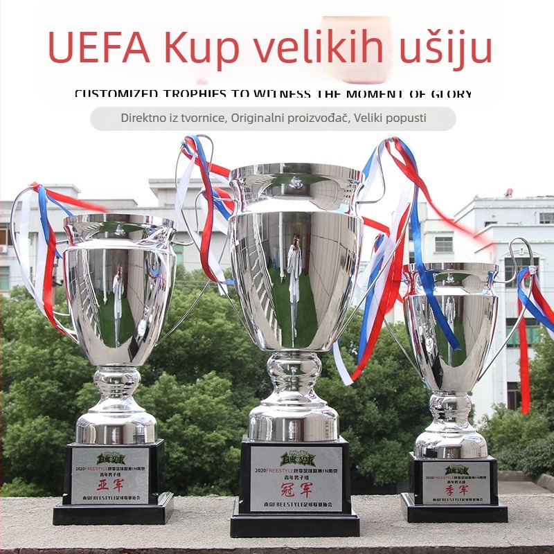 Metalna trofeja s velikim ušima, zlatom, srebrnom i brončanom izdanju za nogomet i košarku u Ligi prvaka; čestne medalje