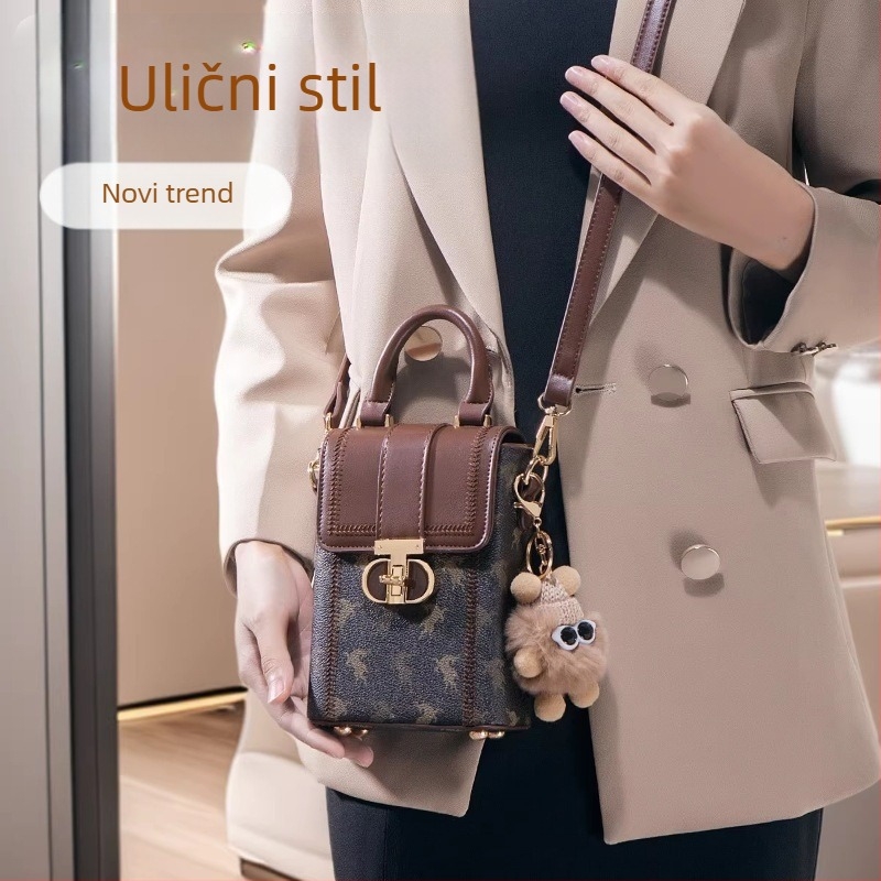 PU ženska torbica za mobitel, ovalni oblik, preko ramena, gradski stil, proljeće 2026