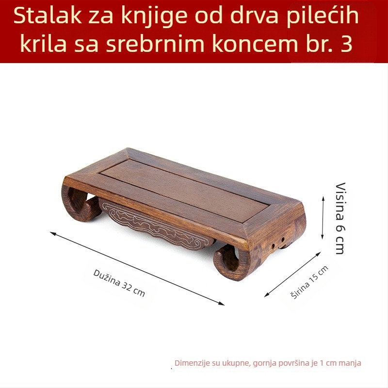 Buddha statua na rezbarenoj podlozi od crvenog drveta, pravokutni čvrsti drveni stalak i dekorativni kamen