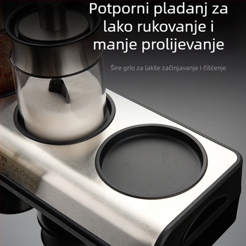 Set posuda za začine s žličicom, staklena posuda za sol i boca za papar u kuhinji