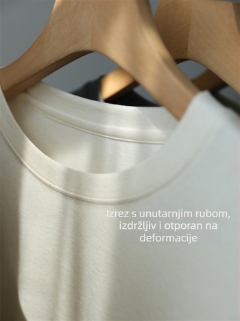 Izuzetno mekana i glatka majica od acetatnih vlakana s kožom-sličnim dodirom, elastičan okrugli vrat, stisnutim strukom i vitkom siluetom, za ranu jesen, kod G071404
