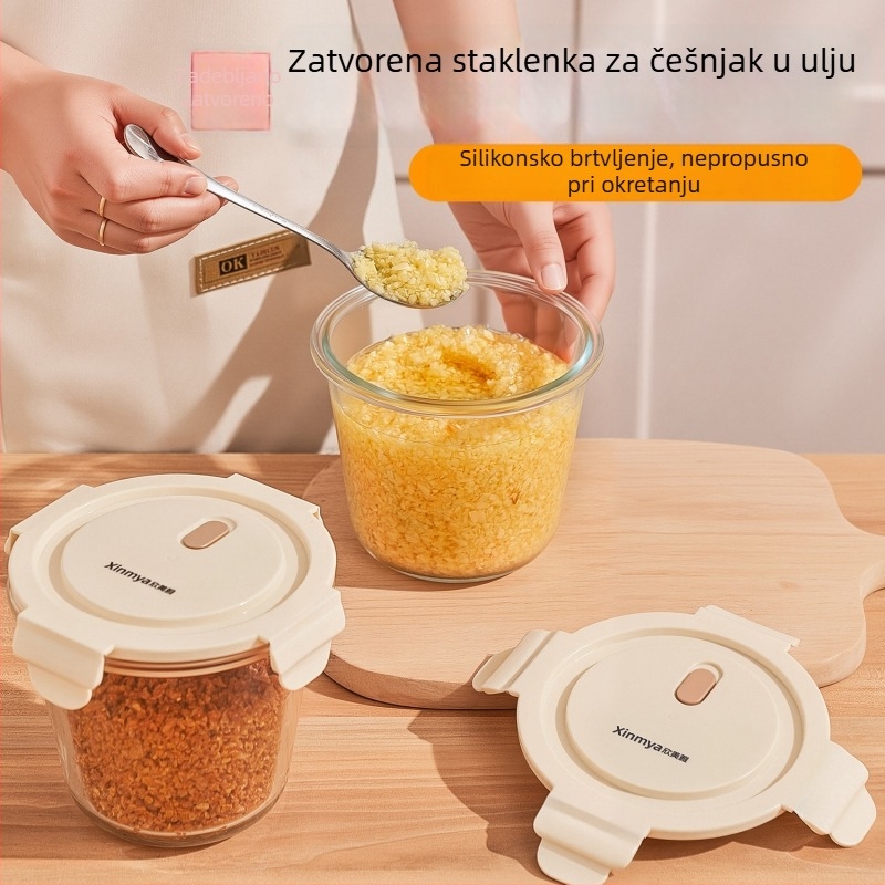 Okrugla staklena posuda za hladnjak sa poklopcem, širokim otvorom, češnjak namočen u ulju