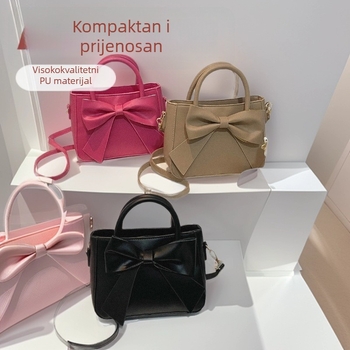 Ženska crossbody torba s mašnicom, jednobojna, mala veličina, PU koža, proljeće 2025