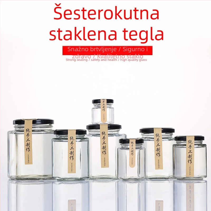 Šesterokutno staklena posuda s poklopcem, zatvorena, prehrambene kvalitete, mala kapaciteta, pogodna za pastu od limuna, med i čili džem