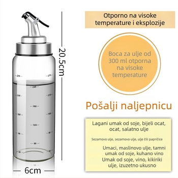 Staklena boca za ulje otporna na toplinu, s brtvom i oznakama za mjerenje u kuhinji.