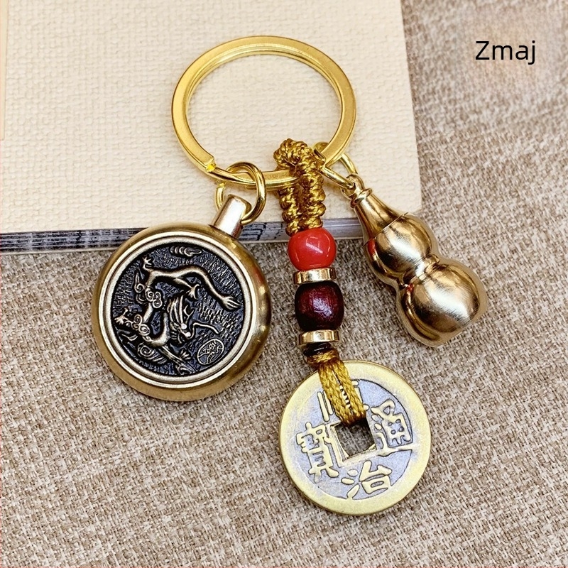 Latun ključ u rotaciji s dvanaest zodija i privjeskom s kovanicama pet cara